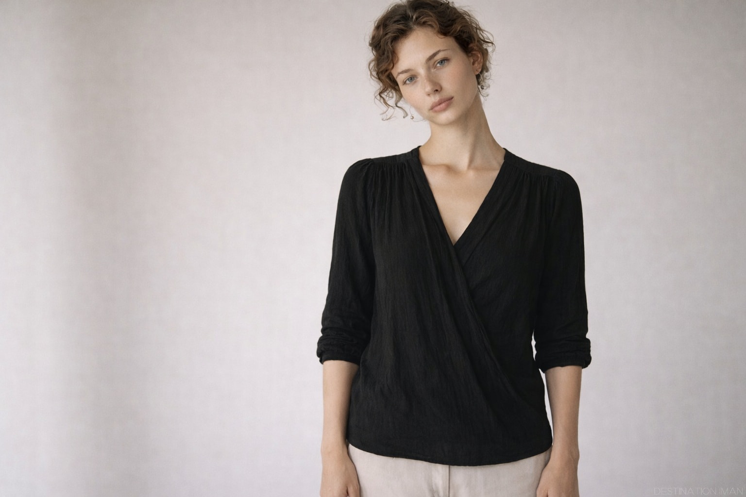 Portrait showing lifeless hand positioning with arms hanging straight down and no engagement in the pose